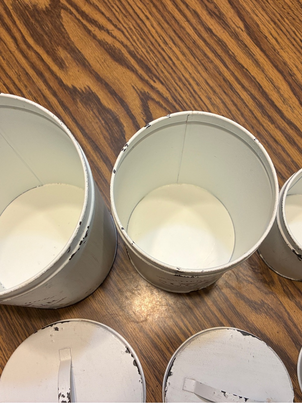 white metal canister set features a distressed farmhouse design "Beautiful Home - Picture 6 of 7